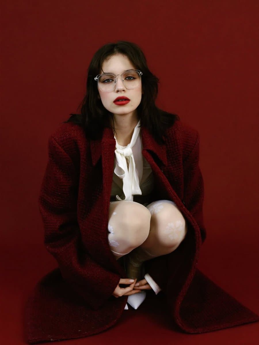 High-Fashion Editorial Portrait with Red Background