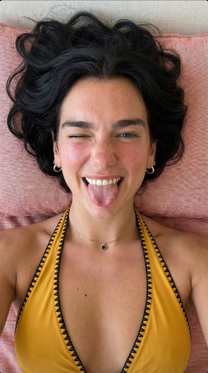 Playful Overhead Portrait Prompt (Winking and Tongue Out) — example 1