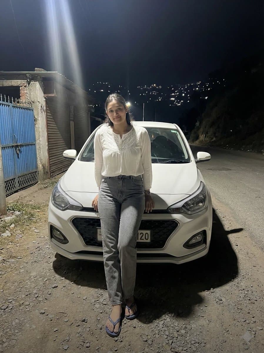 High-Contrast Night Portrait Prompt (Car) — example 1
